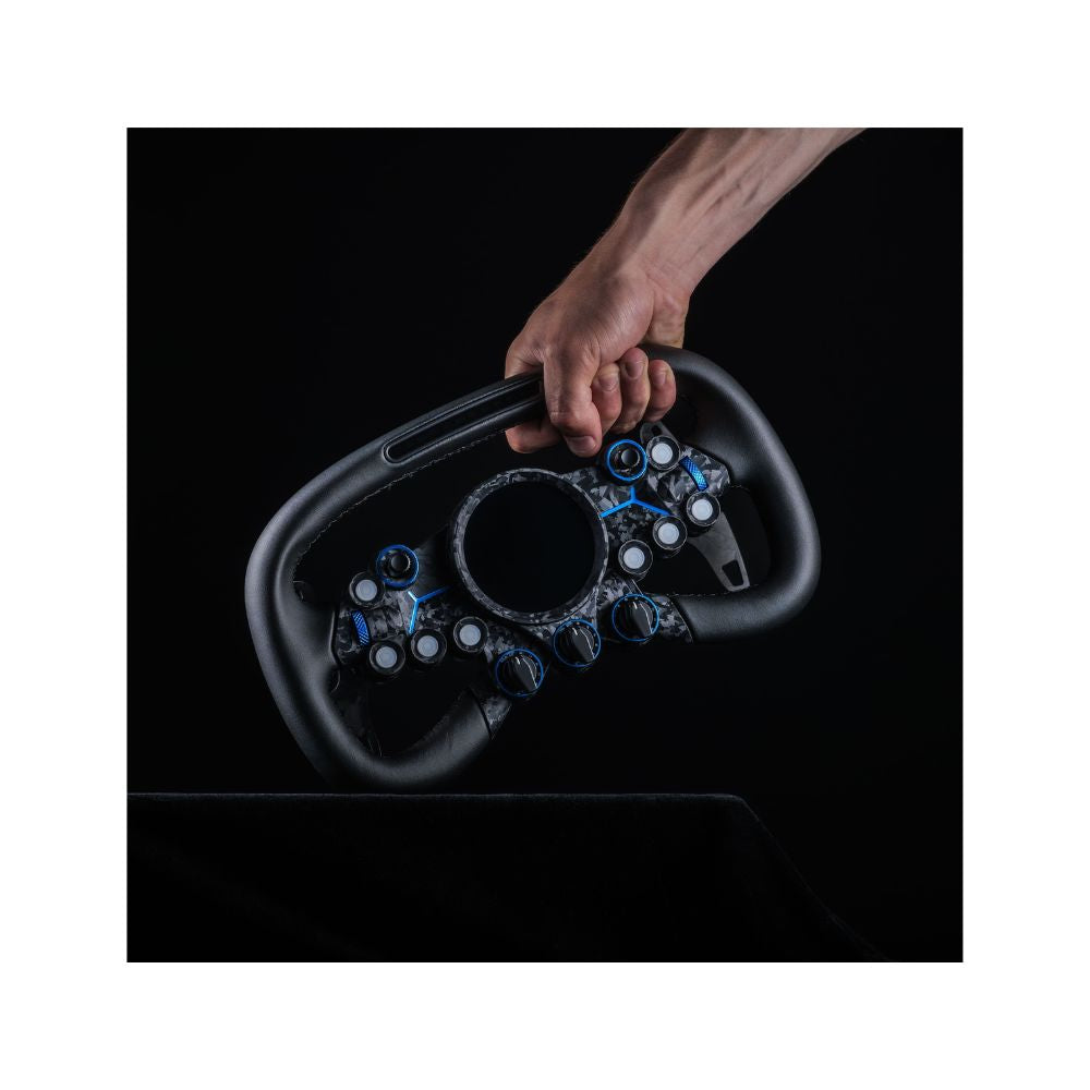 Guy holding a MOZA vision GS wheel