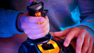 Fingers pressing the T.16000M FCS base buttons