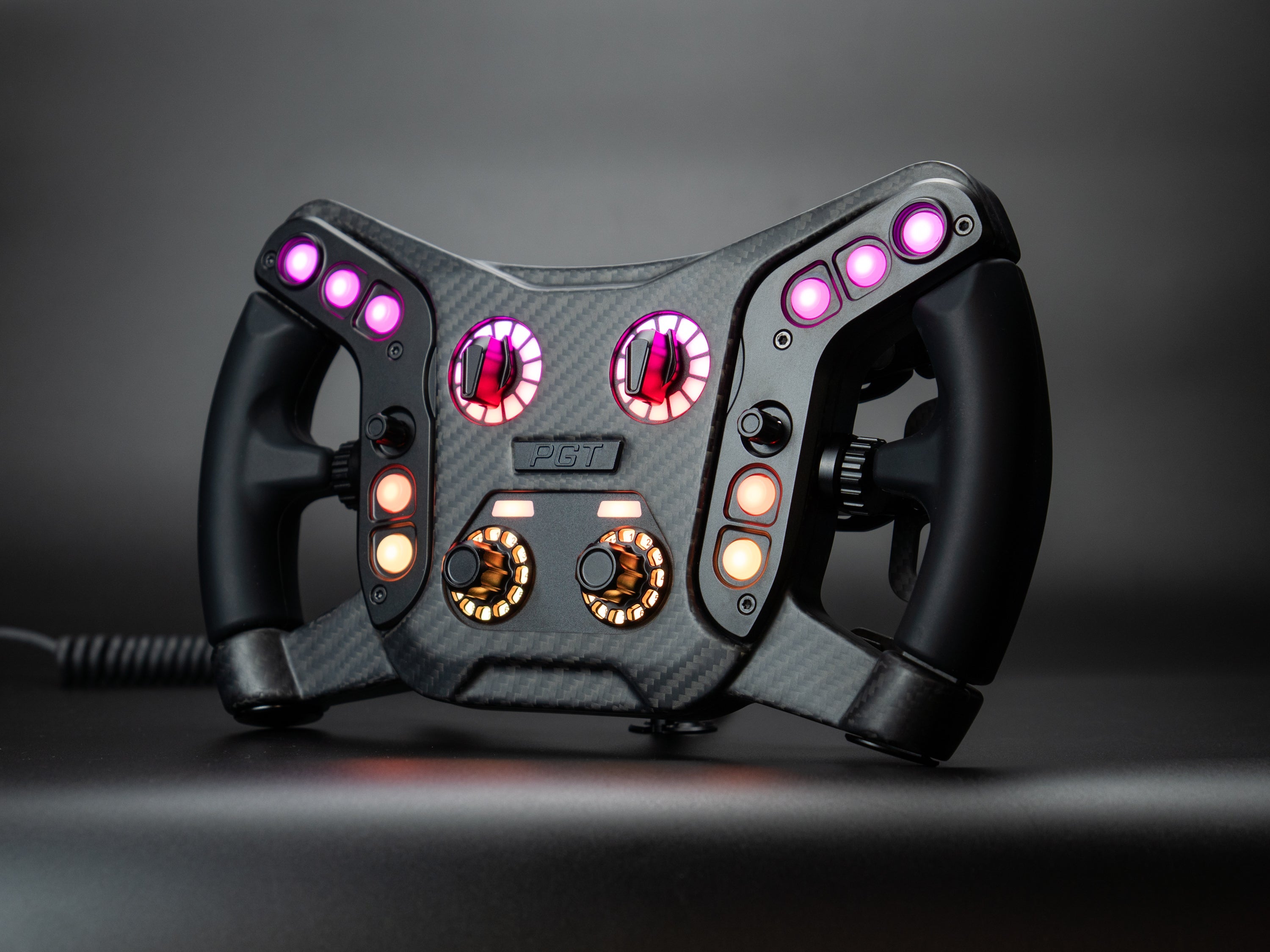 Pokornyi Engineering PGT Vector steering wheel with RGB backlit controls, front angle