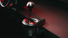 TH8A shifter mounted beside a racing wheel