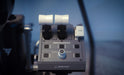 Boeing quadrant thrust levers in blue light