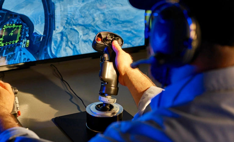 Pilot flying with a grip fitted to the HOTAS Magnetic Base